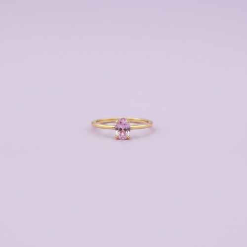 Bague pierre ovale rose fond lilas - vue de face